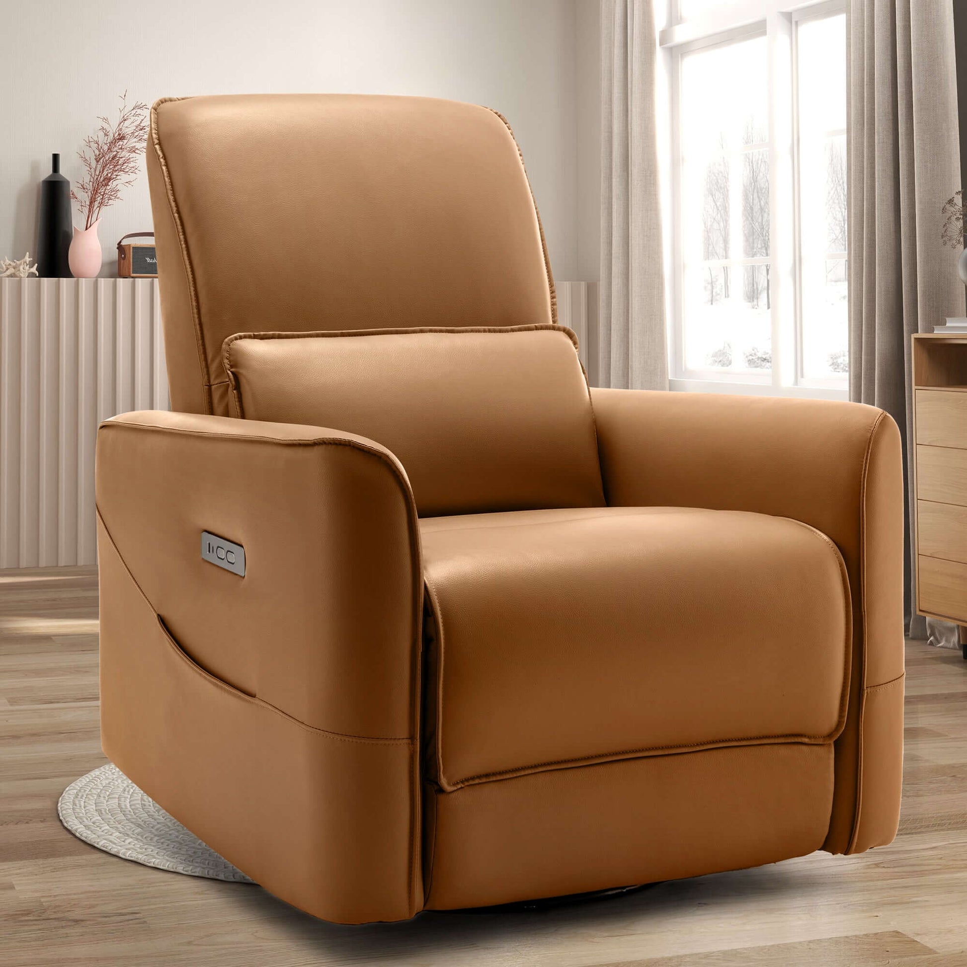 Swivel recliner chair in faux leather for nursery, featuring electric rocking recline and stable design for safety.